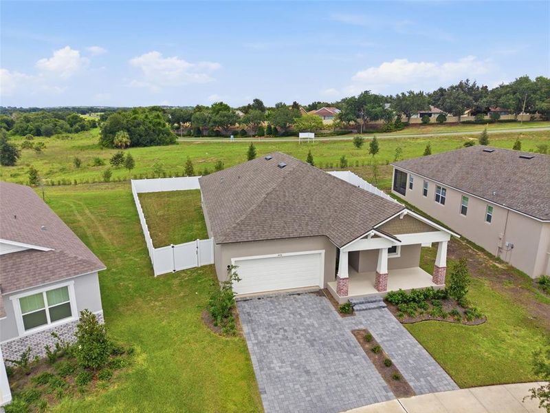 Front exterior of a new home in , Clermont, FL, highlighting curb appeal (Image 26).