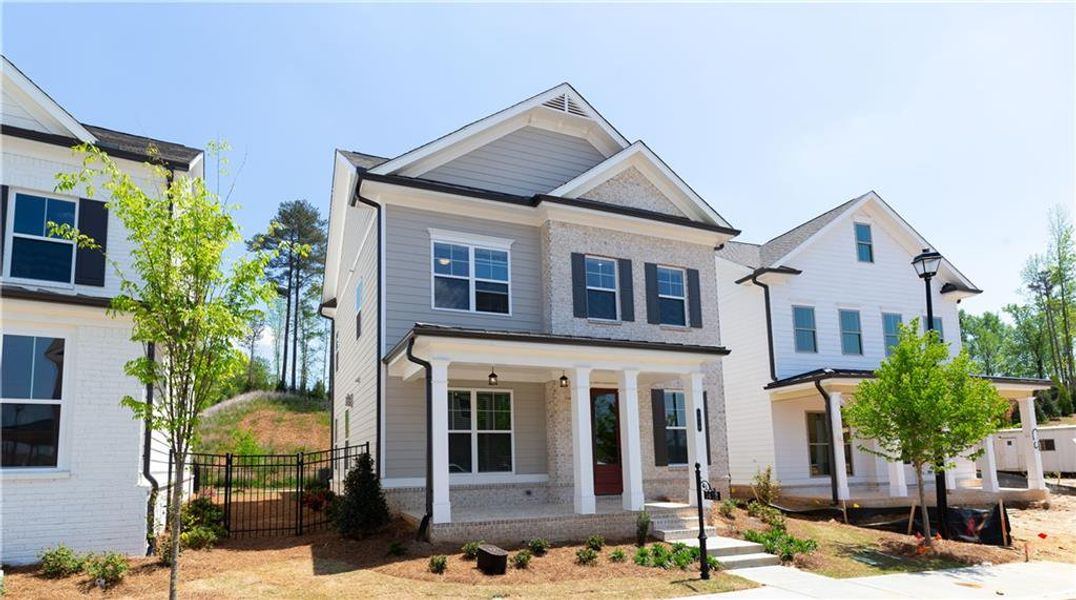 Front exterior of a new home in Waterside Single Family, Peachtree Corners, GA, highlighting curb appeal (Image 25).