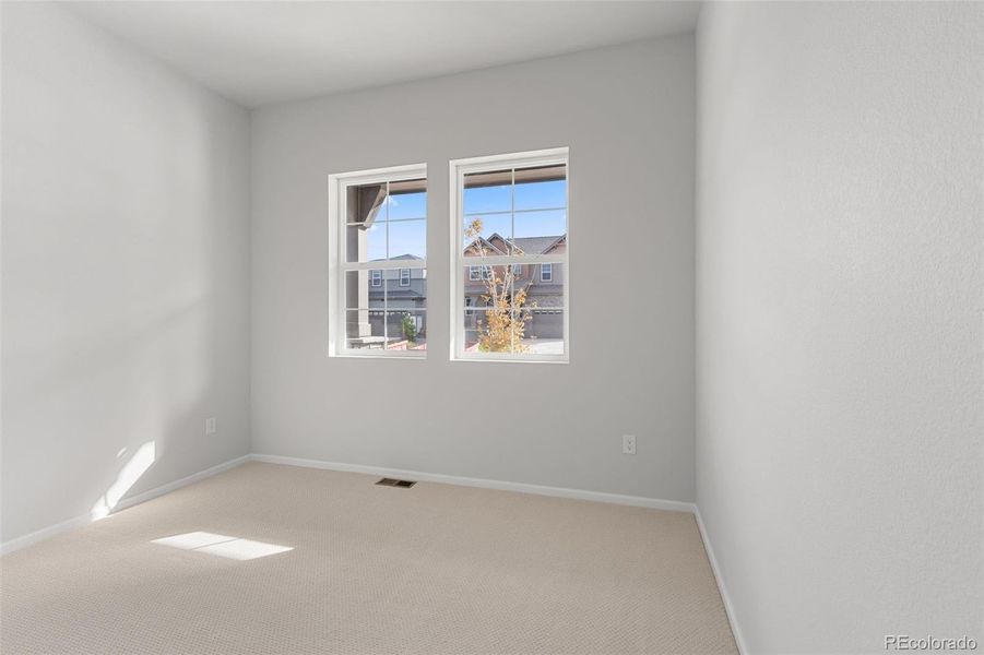 Spacious, unfurnished interior of a new home in The Manors Collection at Golden Overlook, Lakewood (Image 29).
