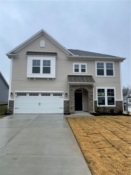 Front exterior of a new home in Springwood Grove, Central, SC, highlighting curb appeal (Image 2).