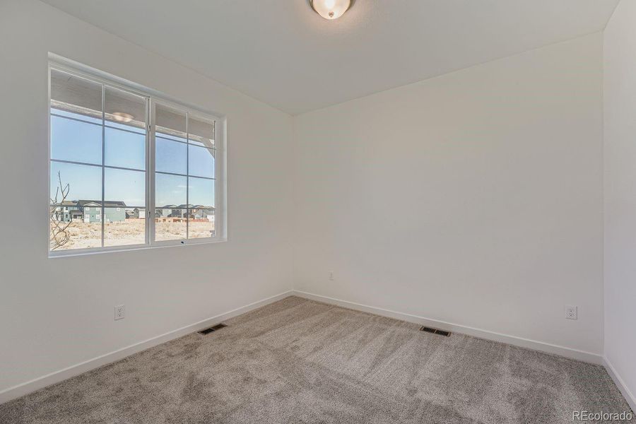 Images not from actual home, but are from same floor plan.