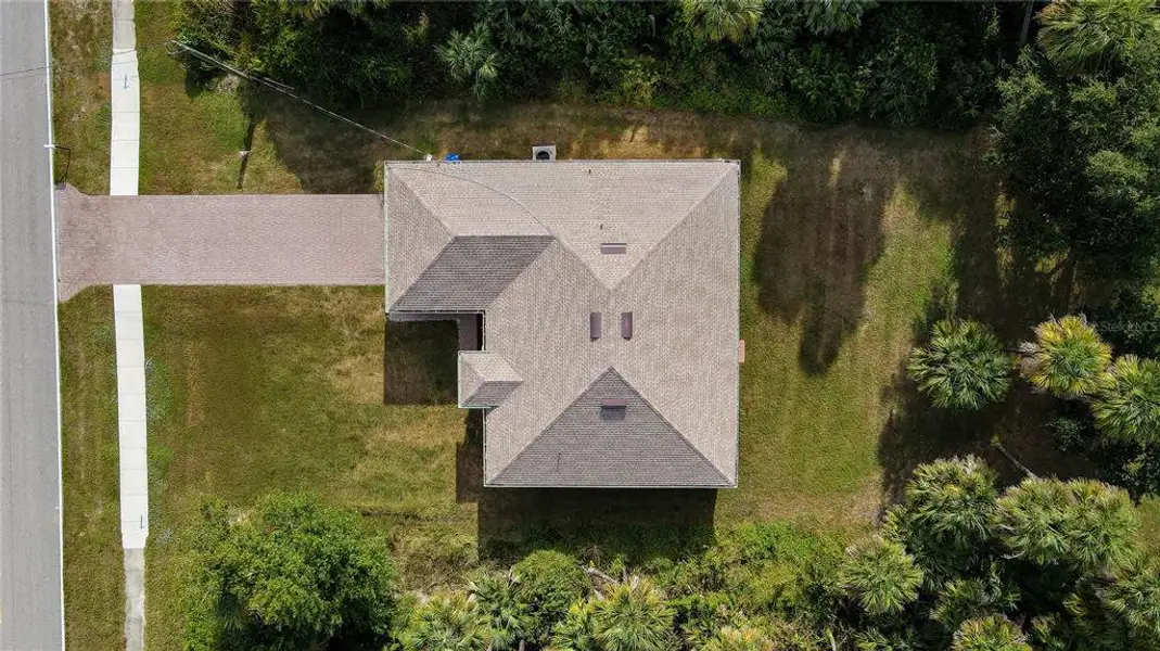 Front exterior of a new home in , North Port, FL, highlighting curb appeal (Image 1).