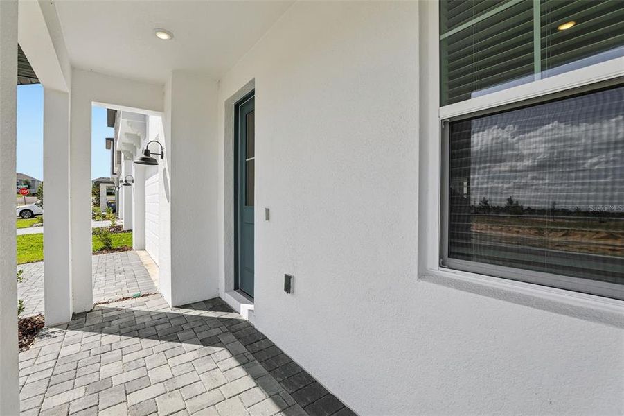 Exterior details and patio area of a home in Cyrene at Minneola, Minneola (Image 3).