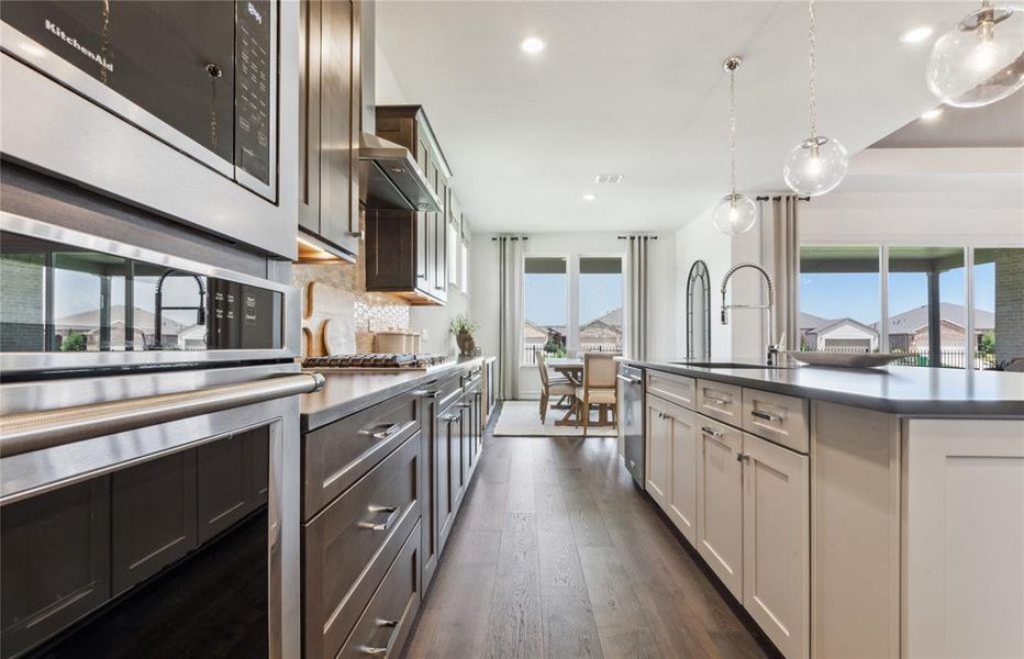 Open kitchen with abundant cabinet space *actual home pictured, furniture not included Open kitchen with abundant cabinet space *actual home pictured, furniture not included