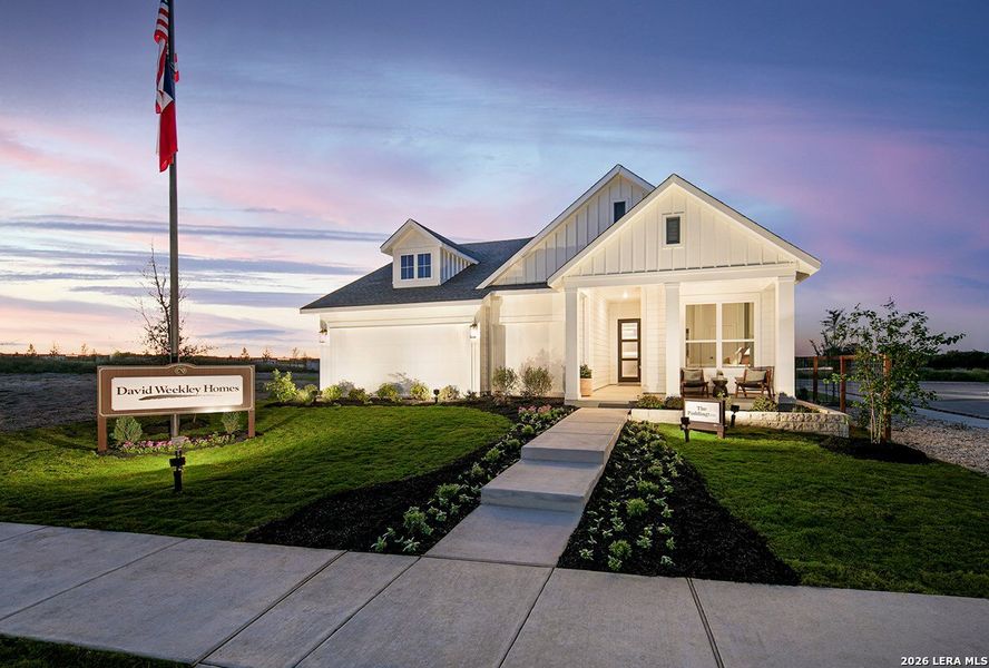 Front exterior of a new home in The Crossvine 55’, Schertz, TX, highlighting curb appeal (Image 2). Front exterior of a new home in The Crossvine 55’, Schertz, TX, highlighting curb appeal (Image 2).