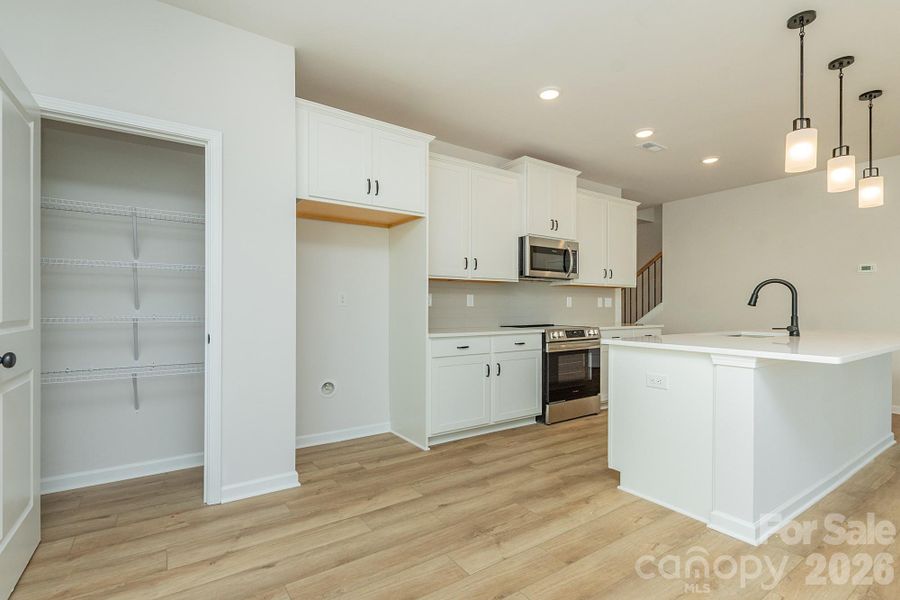 Furnished interior view inside a new home in Sunset Meadows, Charlotte (Image 6).