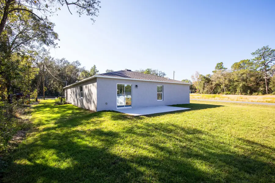 Exterior details and patio area of a home in Palm Bay, Palm Bay (Image 4).