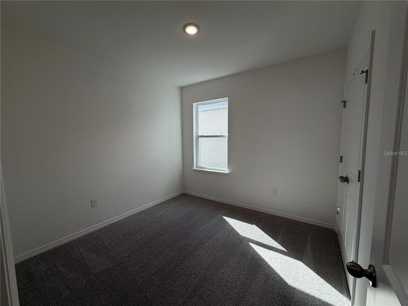 Spacious, unfurnished interior of a new home in Hammock Reserve, Haines City (Image 13).