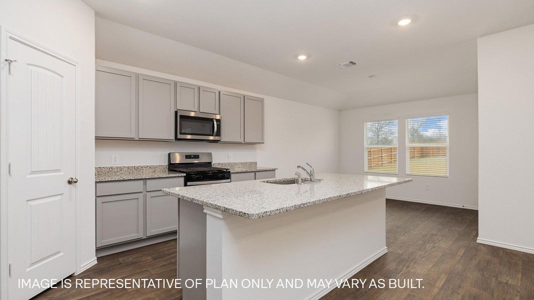 Representative furnished interior of a home built from the The Fairfield by D.R. Horton in Watermill, Uhland (Image 5).