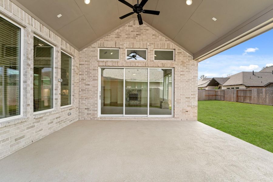 Exterior details and patio area of a home in The Highlands - 65', Porter (Image 26).