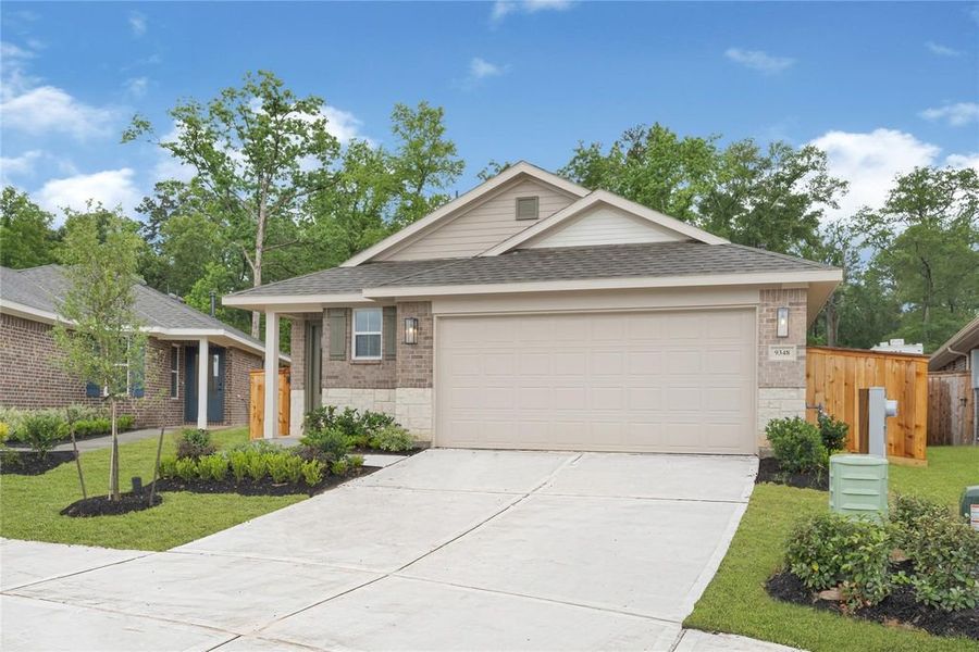 Front exterior of a new home in Stonebrooke, Conroe, TX, highlighting curb appeal (Image 2). Front exterior of a new home in Stonebrooke, Conroe, TX, highlighting curb appeal (Image 2).