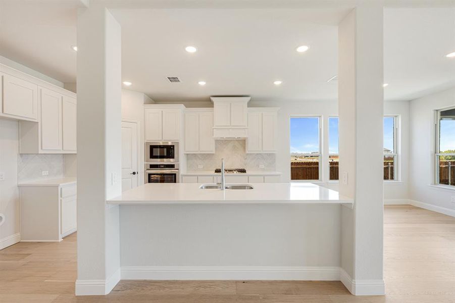 Furnished interior view inside a new home in Hunters Ridge, Crowley (Image 13).