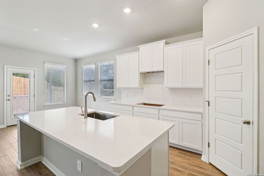 Furnished interior view inside a new home in Estancia Ranch - Classic Series, San Antonio (Image 14).