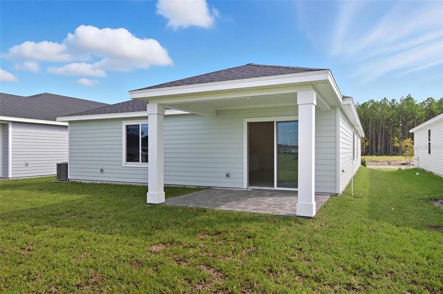 Exterior details and patio area of a home in , Palm Coast (Image 4). Exterior details and patio area of a home in , Palm Coast (Image 4).