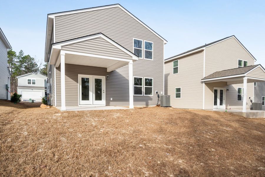 Exterior details and patio area of a home in Grand Arbor, Blythewood (Image 4).