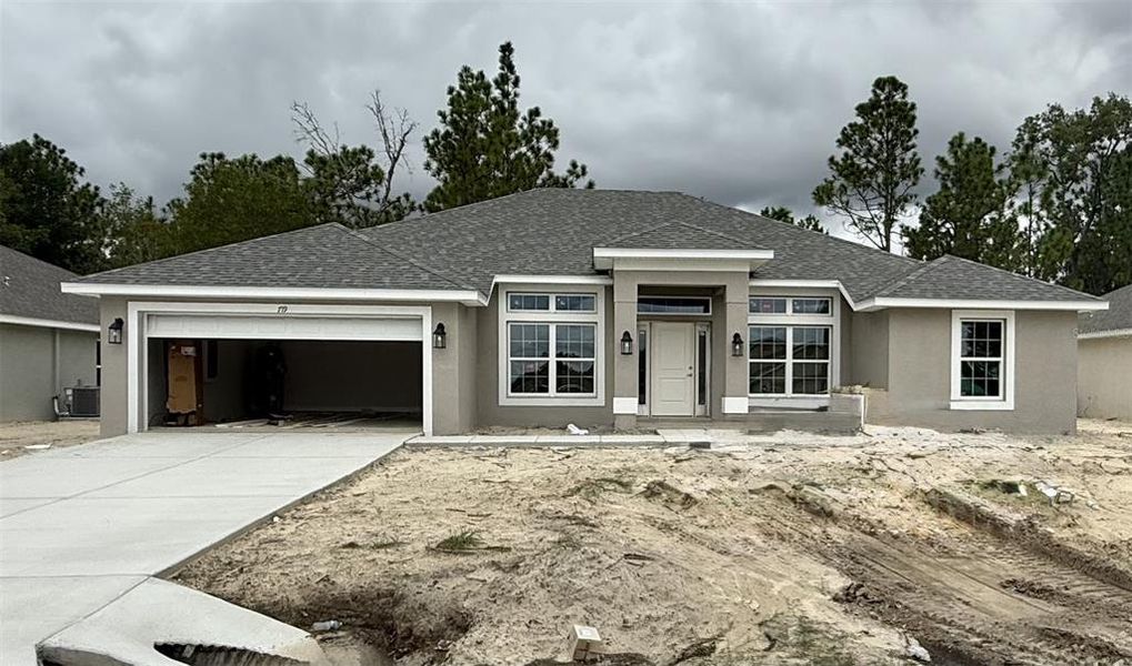 Front exterior of a new home in Citrus Springs Sub, Citrus Springs, FL, highlighting curb appeal (Image 1).