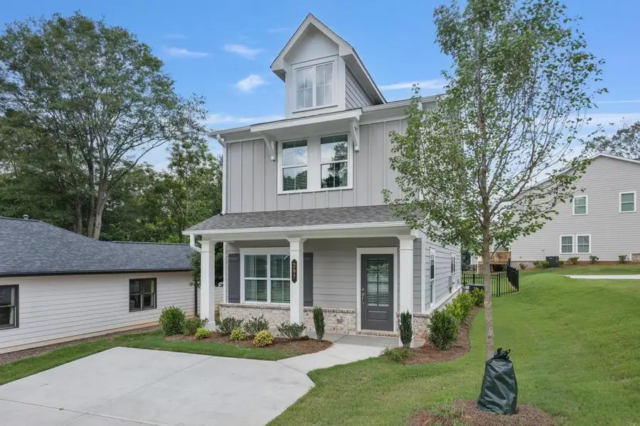 Front exterior of a new home in , Marietta, GA, highlighting curb appeal (Image 2). Front exterior of a new home in , Marietta, GA, highlighting curb appeal (Image 2).