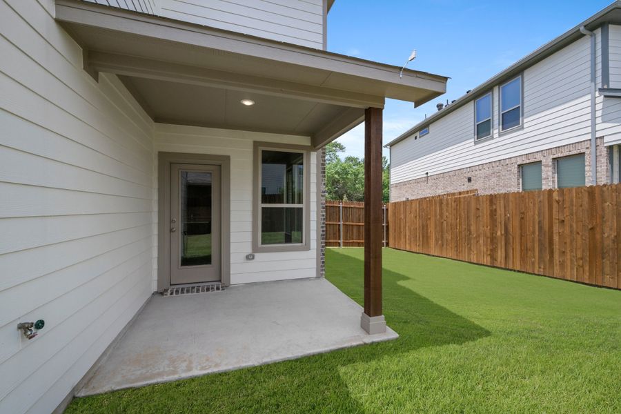 Front exterior of a new home in Eagle Cove, Denton, TX, highlighting curb appeal (Image 18).