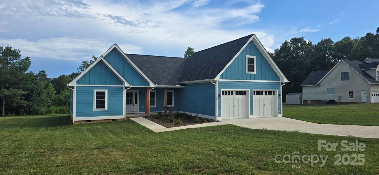 Front exterior of a new home in , Rutherfordton, NC, highlighting curb appeal (Image 18).