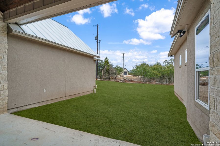 Exterior details and patio area of a home in , Blanco (Image 4).