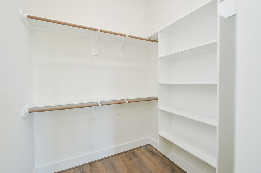 Primary Closet(Sample photo from similar floor plan built by the builder)