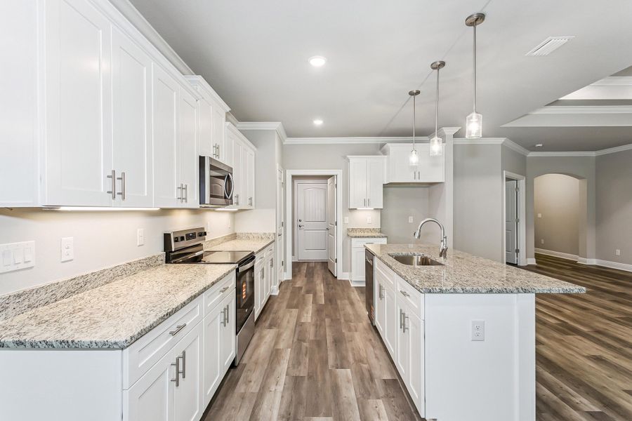 Representative furnished interior of a home built from the The Sapphire Estate by Herbst Homes in Walther Reserve, Milton (Image 7).