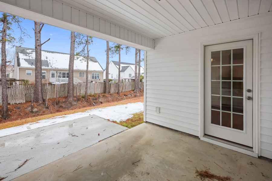 Exterior details and patio area of a home in Davenport Farms, Winterville (Image 30).