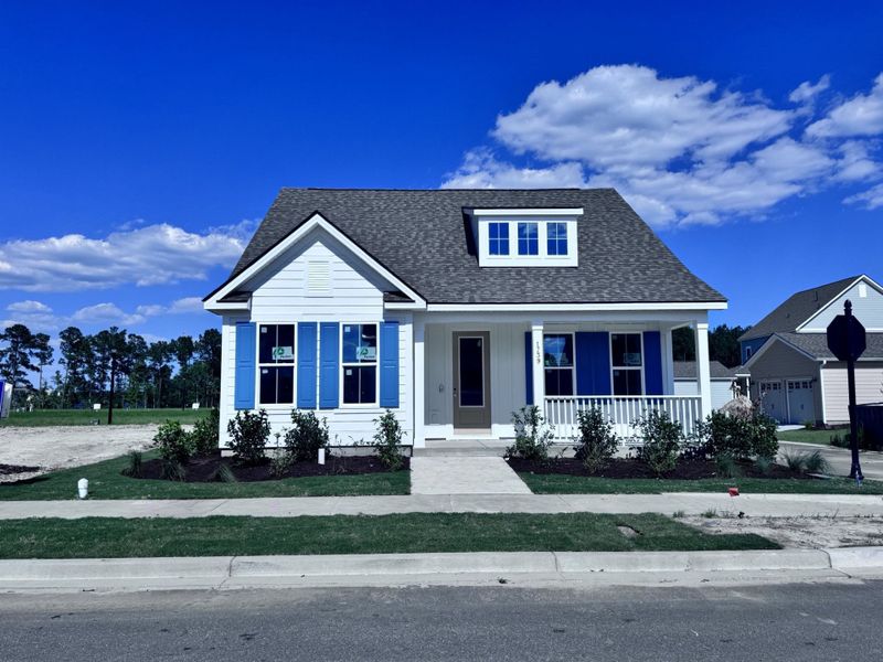 Front exterior of a new home in SayeBrook, Myrtle Beach, SC, highlighting curb appeal (Image 23). Front exterior of a new home in SayeBrook, Myrtle Beach, SC, highlighting curb appeal (Image 23).