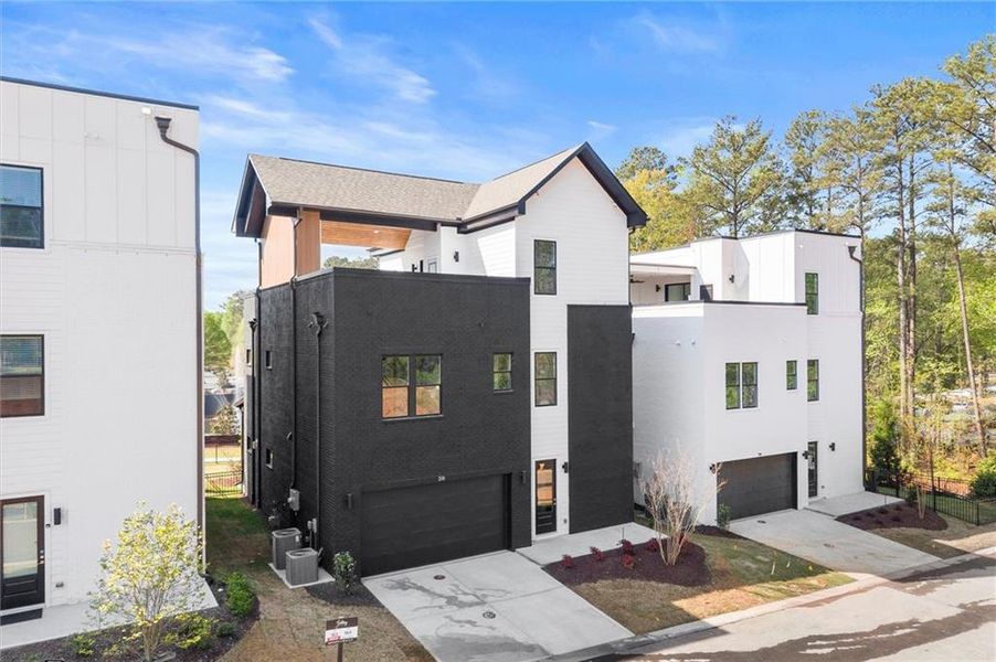 Front exterior of a new home in The Gathering – Alpharetta, Alpharetta, GA, highlighting curb appeal (Image 27).