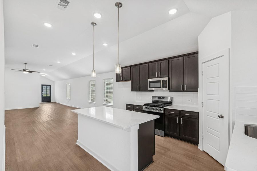 Furnished interior view inside a new home in Pinewood at Grand Texas, New Caney (Image 4).