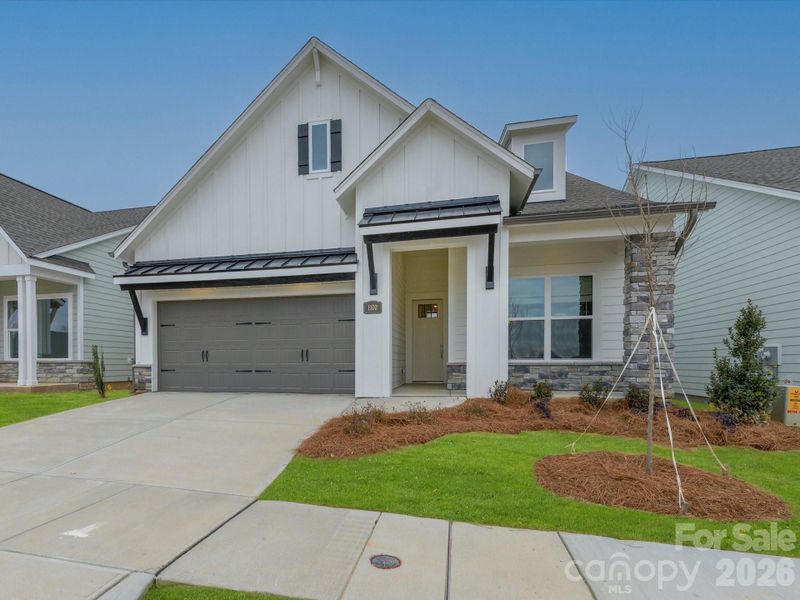 Front exterior of a new home in Encore at Streamside - Classic Series, Waxhaw, NC, highlighting curb appeal (Image 21).