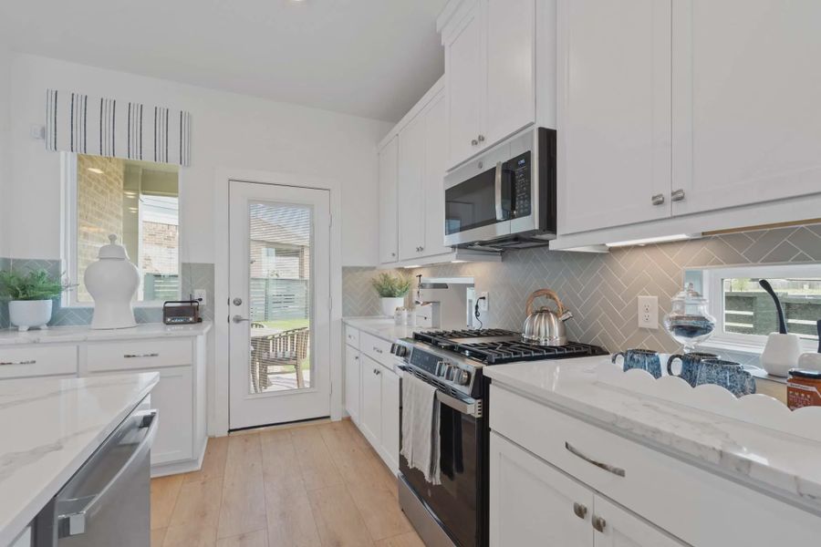 Representative furnished interior of a home built from the Riverdale by Chesmar Homes in Bridgeland, Elgin (Image 9).