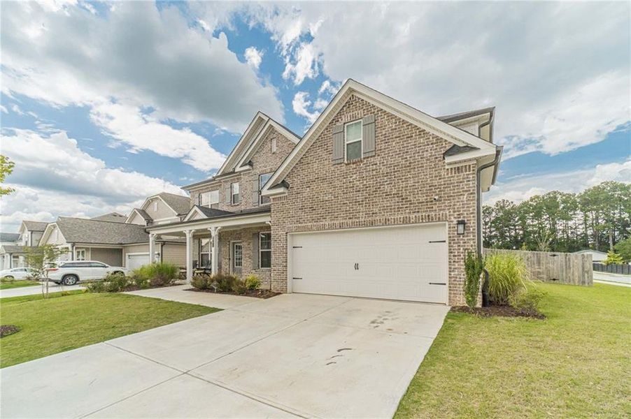 Front exterior of a new home in , Grayson, GA, highlighting curb appeal (Image 26). Front exterior of a new home in , Grayson, GA, highlighting curb appeal (Image 26).