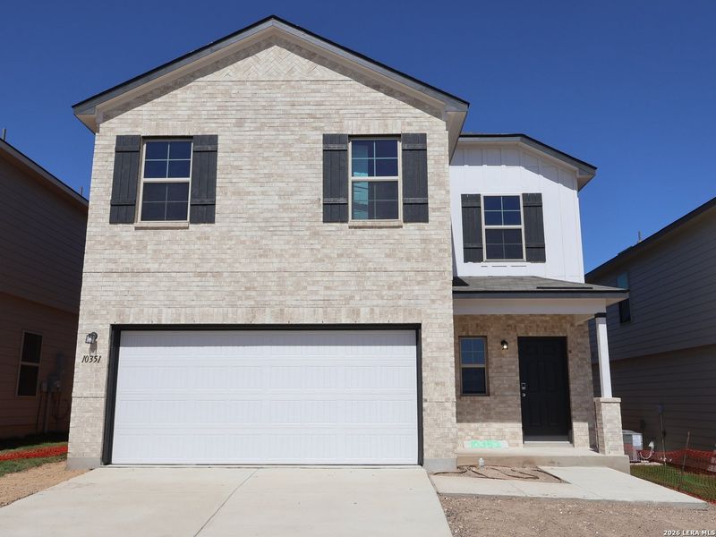 Front exterior of a new home in Paloma Park, Converse, TX, highlighting curb appeal (Image 19).