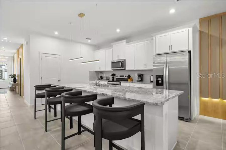 Furnished interior view inside a new home in Solara Resort, Kissimmee (Image 14).