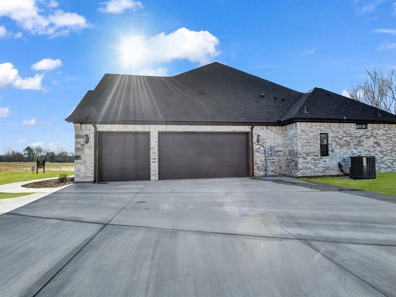 Front exterior of a new home in , Weatherford, TX, highlighting curb appeal (Image 27).