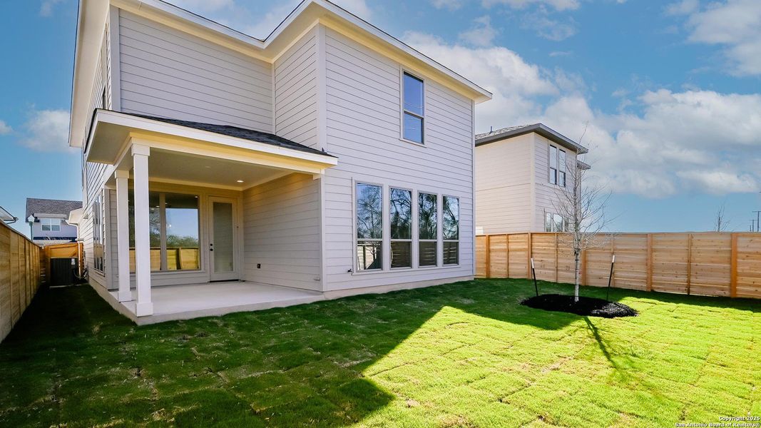 Front exterior of a new home in Solms Landing 45', New Braunfels, TX, highlighting curb appeal (Image 2).