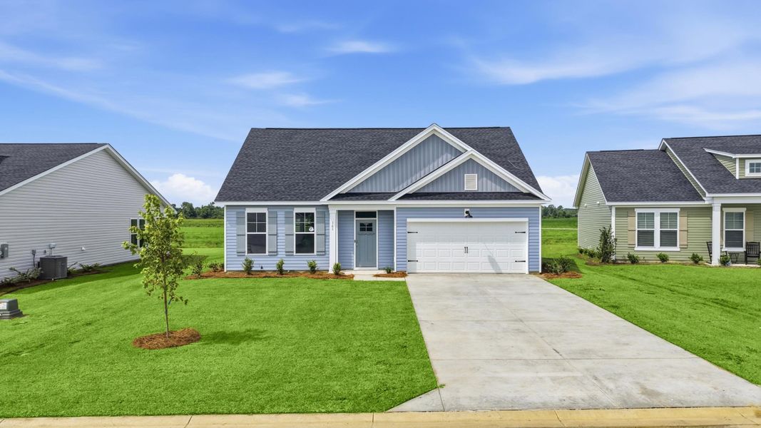 Front exterior of a new home in Edgefield, Loris, SC, highlighting curb appeal (Image 21).