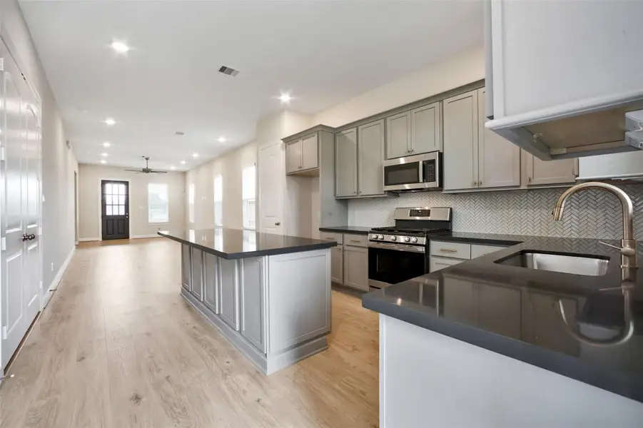 Furnished interior view inside a new home in Pearland Old Townsite, Pearland (Image 3).