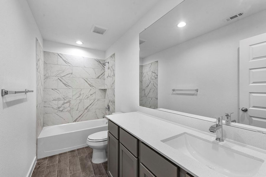 Furnished interior view inside a new home in Grand Mason Crossing, Katy (Image 10).