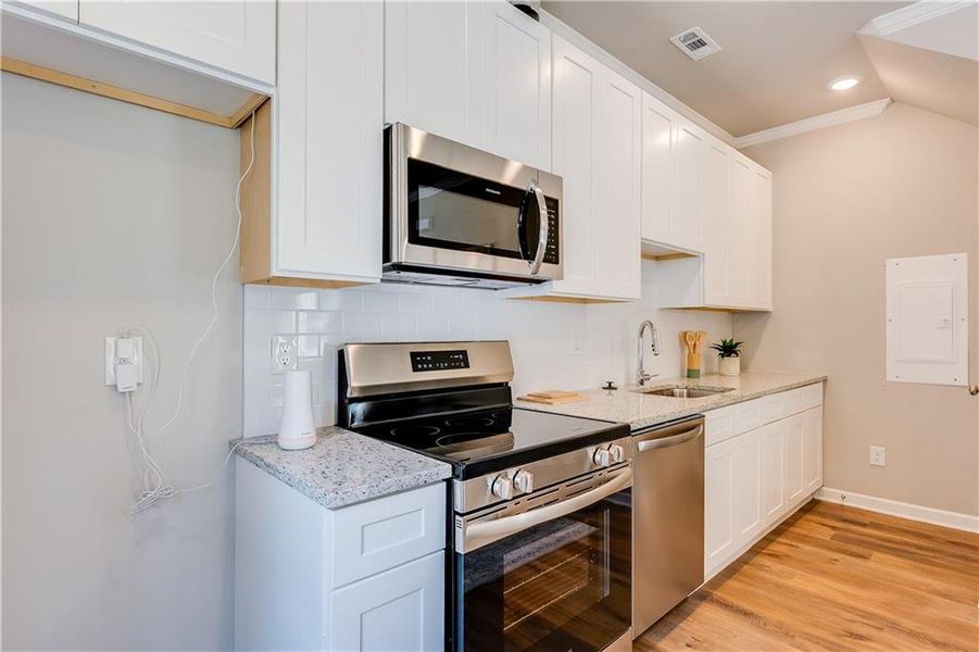 Furnished interior view inside a new home in , Atlanta (Image 9). Furnished interior view inside a new home in , Atlanta (Image 9).