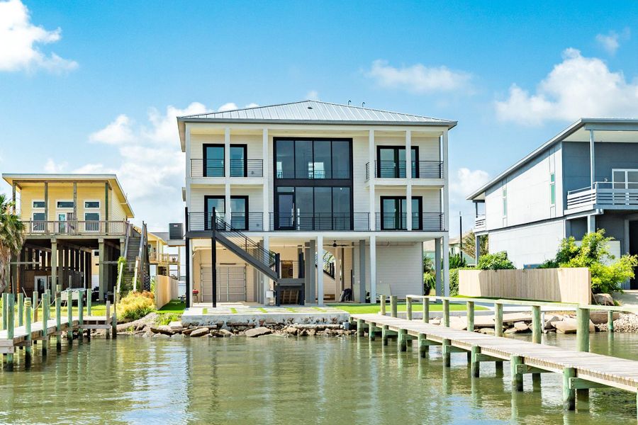 Front exterior of a new home in , Galveston, TX, highlighting curb appeal (Image 18). Front exterior of a new home in , Galveston, TX, highlighting curb appeal (Image 18).