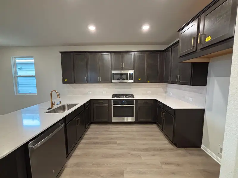 Furnished interior view inside a new home in Cannon Ranch 45s, Dripping Springs (Image 5).
