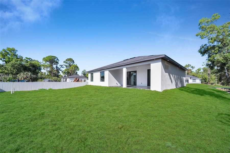 Exterior details and patio area of a home in , Lehigh Acres (Image 25).