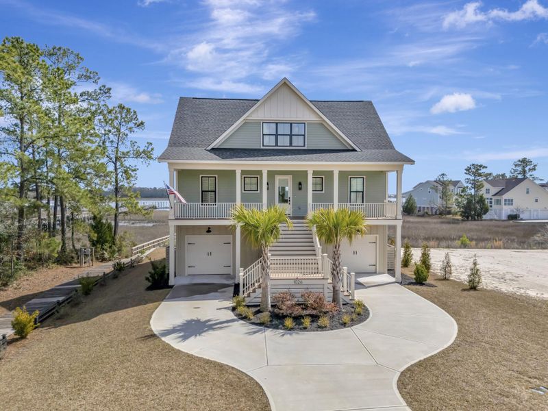 Front exterior of a new home in , Wando, SC, highlighting curb appeal (Image 25).