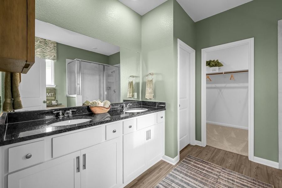 Representative furnished interior of a home built from the Robin by Taylor Morrison in Longview 50s, Del Valle (Image 15).