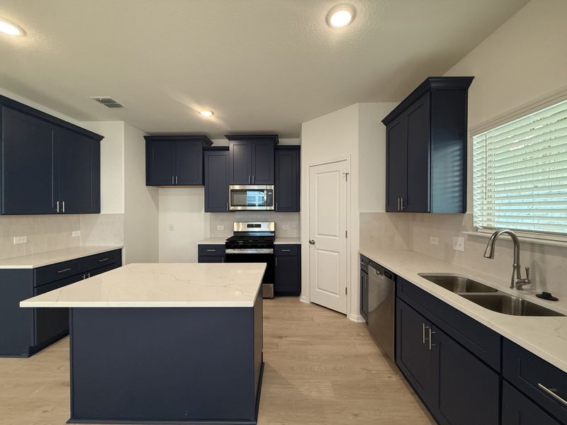 Furnished interior view inside a new home in The Hills of Bear Creek, Austin (Image 10).