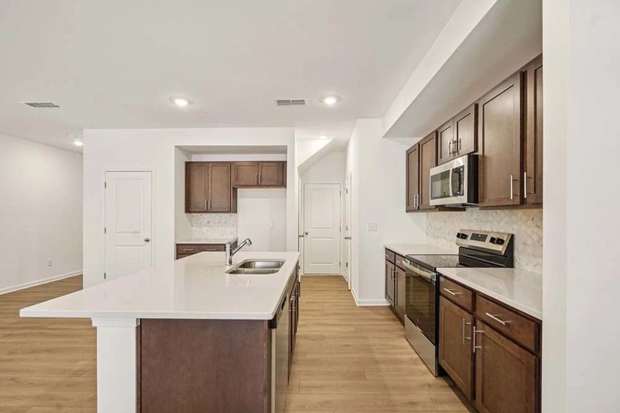 Sample Photo: Kitchen featuring Roosevelt Collection Finishes Sample Photo: Kitchen featuring Roosevelt Collection Finishes