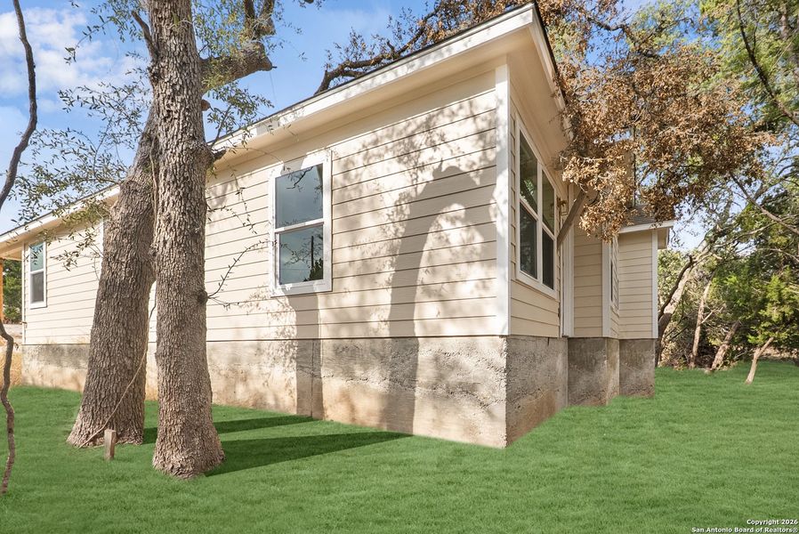 Exterior details and patio area of a home in , Spring Branch (Image 1). Exterior details and patio area of a home in , Spring Branch (Image 1).