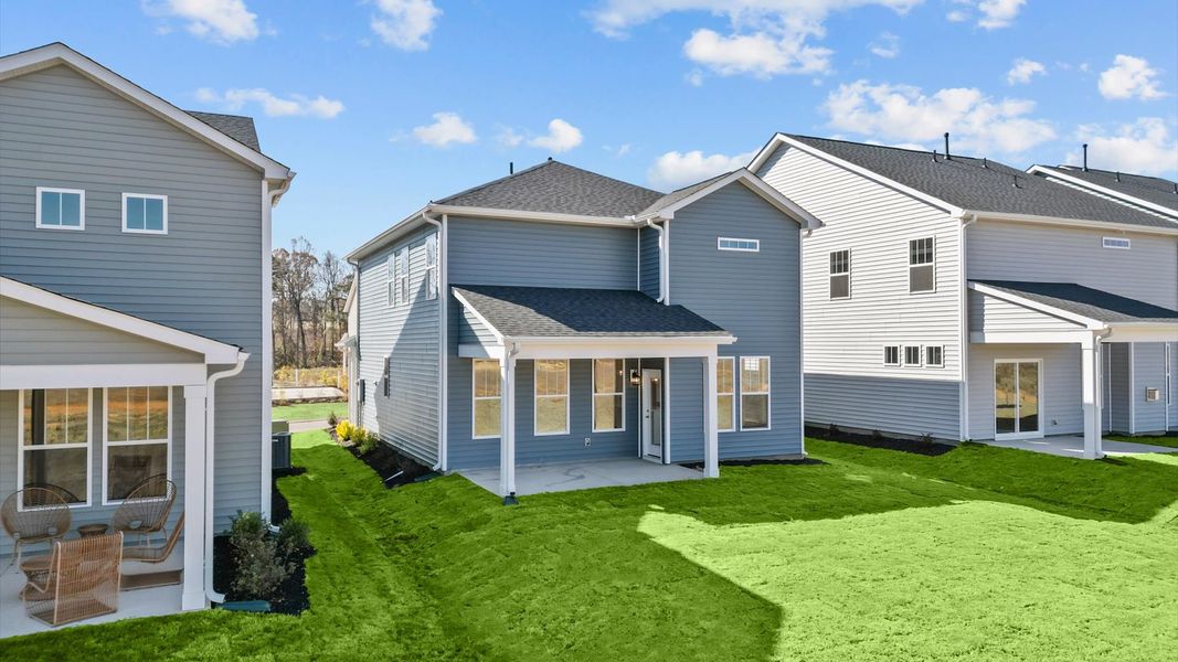 Exclusive rear covered porch with accomplished detail and elevated outdoor living potential